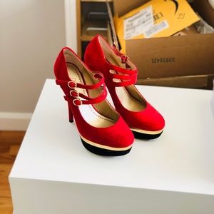 red, gold and black strappy heels